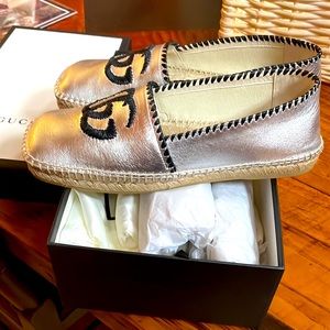 Authentic Gucci,  silver espadrilles. Never been worn.